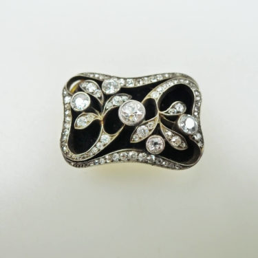 rectangular pin brooch set with diamond over velvet